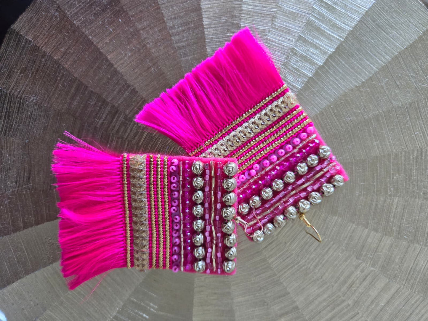 magenta embroidered tassel earrings