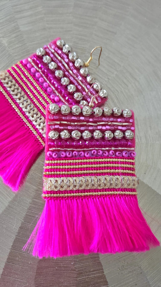 magenta embroidered tassel earrings