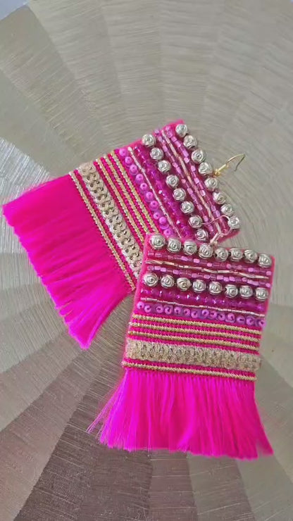 magenta embroidered tassel earrings
